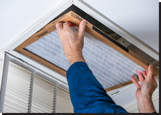 Technician Installing AC Filter